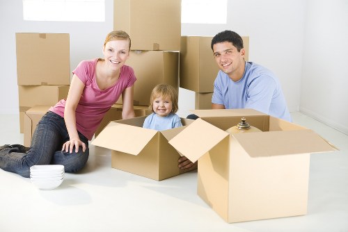 Furniture removals team loading sofas in Brent