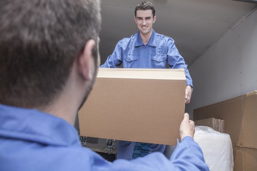 Man and van moving furniture in Brent residential area