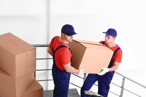 Moving boxes and furniture during a Brent home relocation