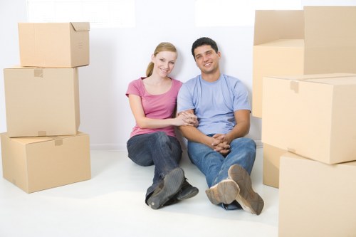Careful packing and wrapping of household items by house removalists in Brent