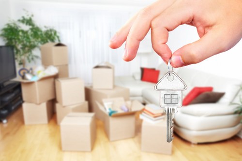 Office relocation planning in Brent with moving boxes and workstations