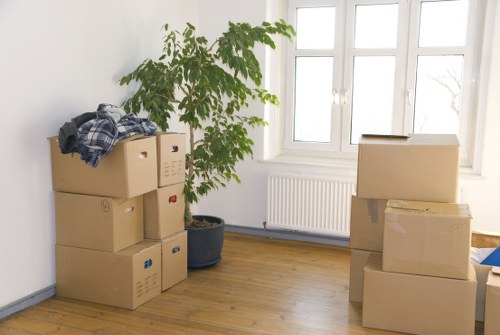 Packed moving boxes prepared for house removals in Brent