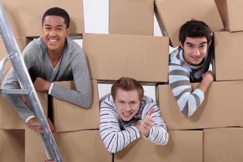 Packed student belongings ready for collection in a Brent flat