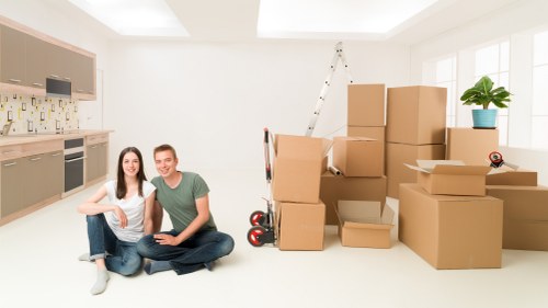 Organized household items packed into boxes in Brent