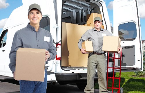 Packed boxes and furniture inside a removal van in Brent