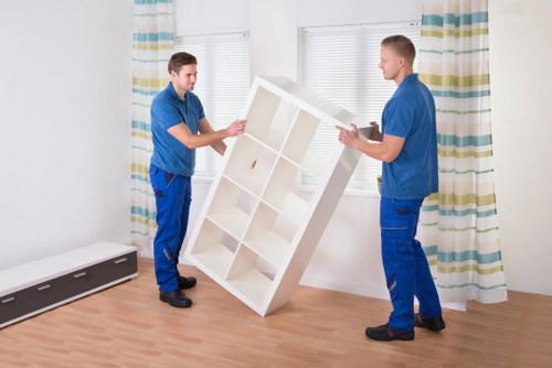 Removal team loading furniture for same day removals in Brent
