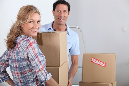 Professional office movers handling furniture and equipment in Brent