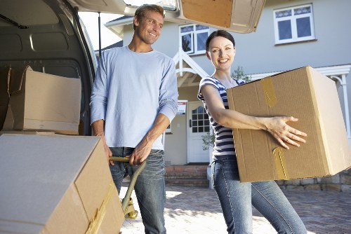 Staff assessing lifting risks before carrying heavy items