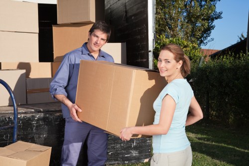 Commercial moving team organizing a Brent relocation